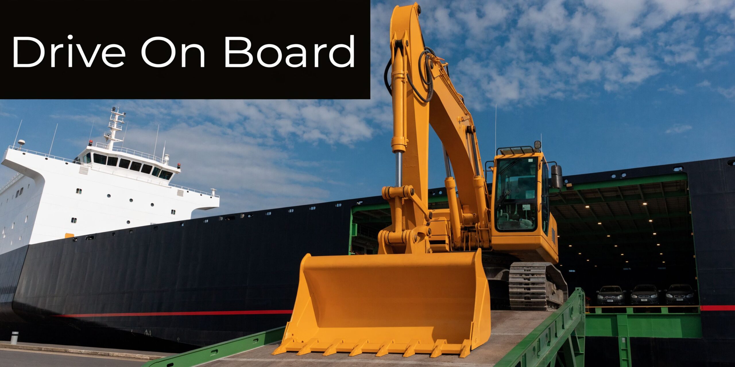 A large yellow excavator driving onto the loading ramp of a roll on roll off cargo ship.